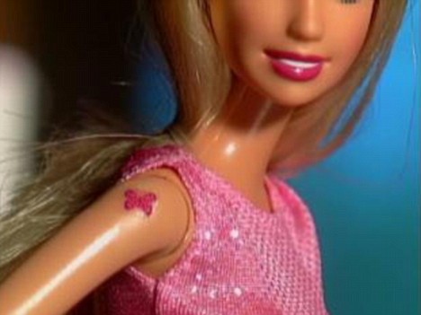 Tattoo Barbie Gets a Tramp Stamp